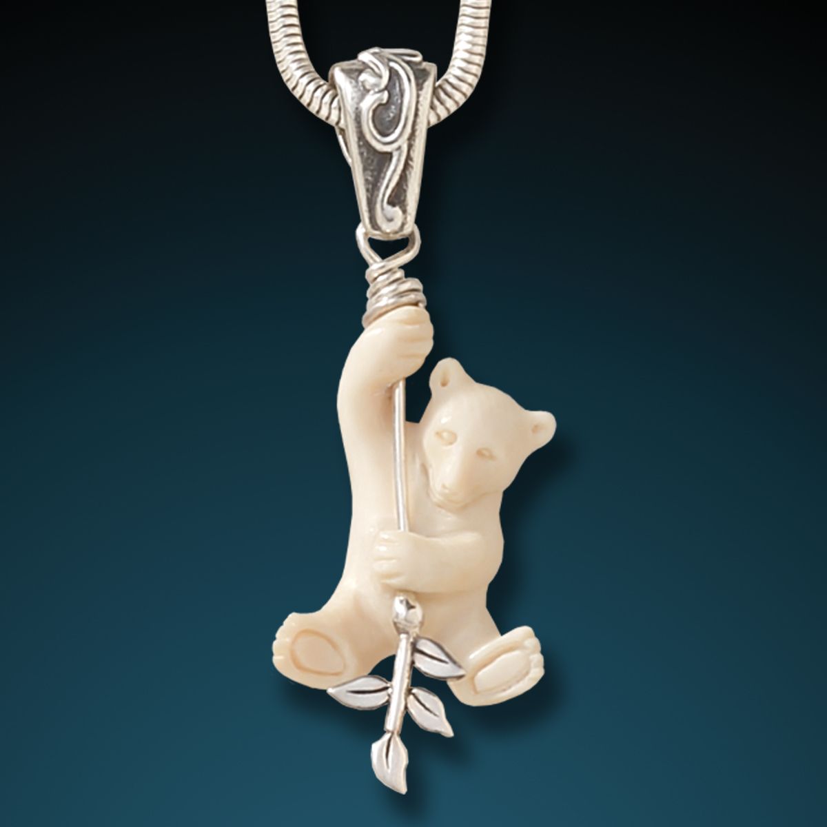 FOSSILIZED MAMMOTH IVORY BEAR PENDANT - OUT ON A LIMB