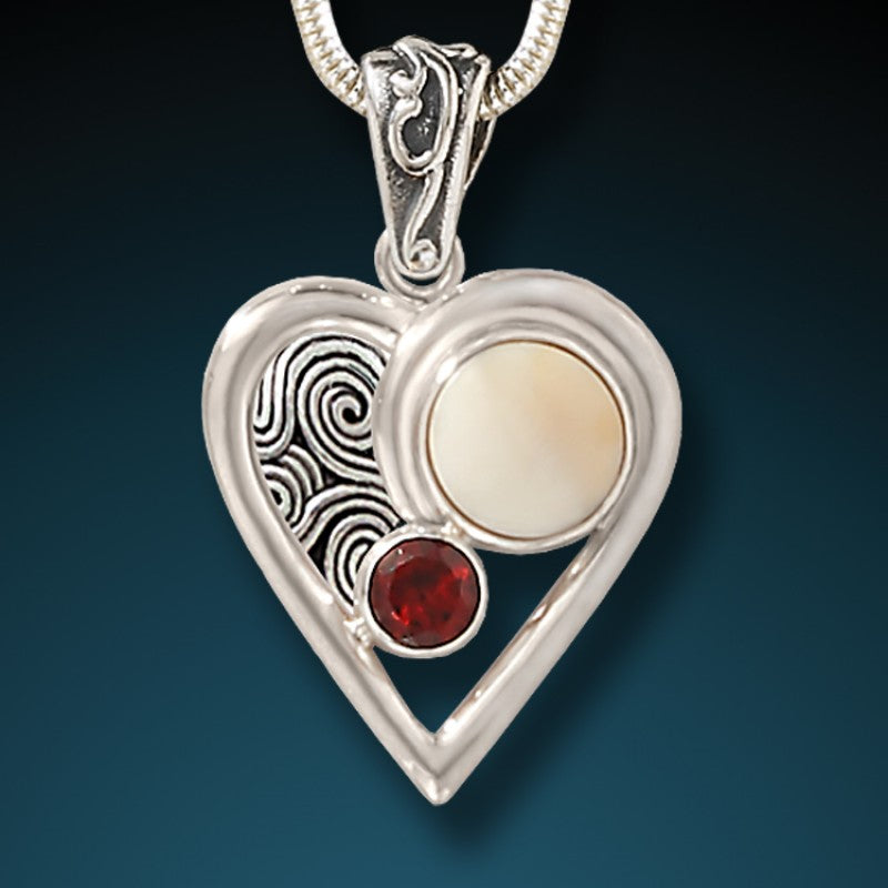 "Heartbeat" Fossilized Mammoth Garnet and Sterling Silver Pendant