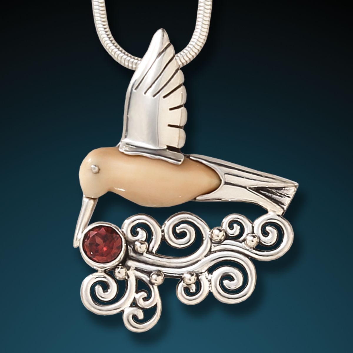FOSSILIZED WALRUS TUSK, SILVER, GARNET HUMMINGBIRD PENDANT - HEART SONG HUMMINGBIRD