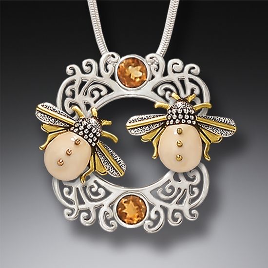 FOSSILIZED WALRUS IVORY AND SILVER PENDANT - SUN KISSED BEES