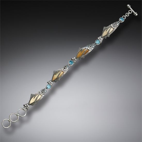 HANDMADE SILVER JEWELED FISH BRACELET WITH FOSSILIZED WALRUS IVORY AND BLUE TOPAZ - TREASURES FROM THE STREAM