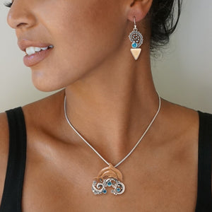 "Two Dolphins" Ancient Fossilized Mammoth Tusk Ivory and Blue Topaz Silver Pin or Pendant